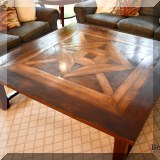 F03. Large square parquet coffee table. 20”h x 60”w 